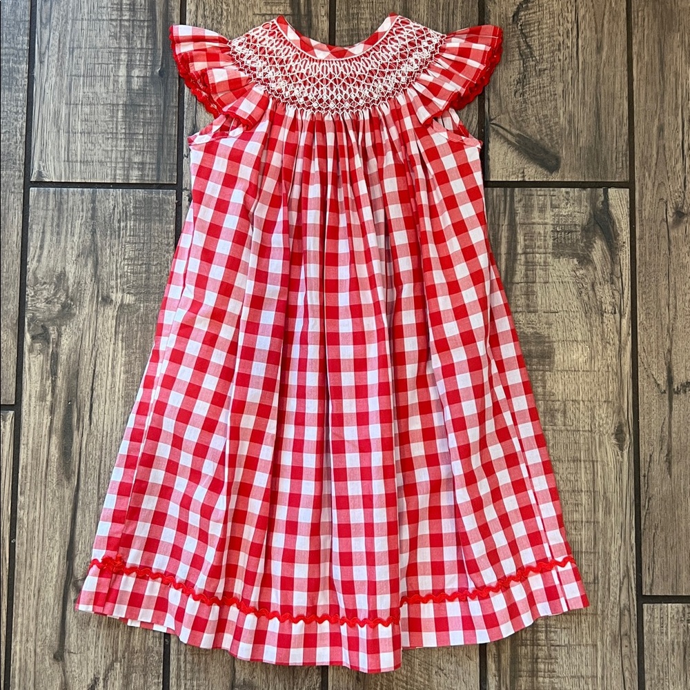 Smocked Auctions Red and White Gingham Bishop Dress with ric rac trim.